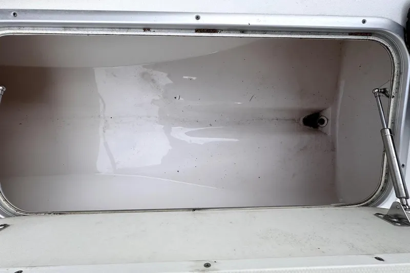 Slide: The Image of Storage compartment of a 2020 Cape Horn 27 XS boat, showing interior details. - 49