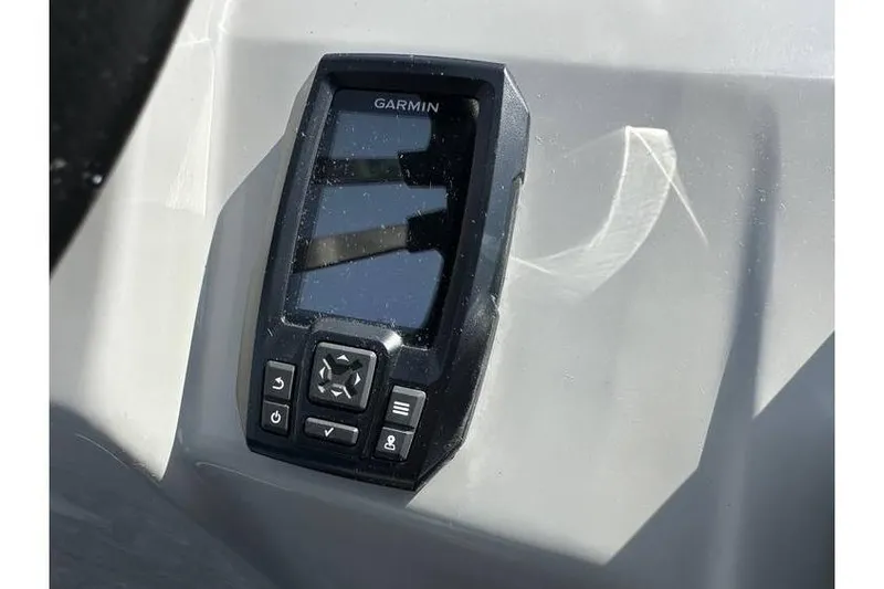 Slide: The Image of Garmin device on 2023 Bennington 20 SVL boat dashboard, featuring Yamaha 25Hp engine. - 17
