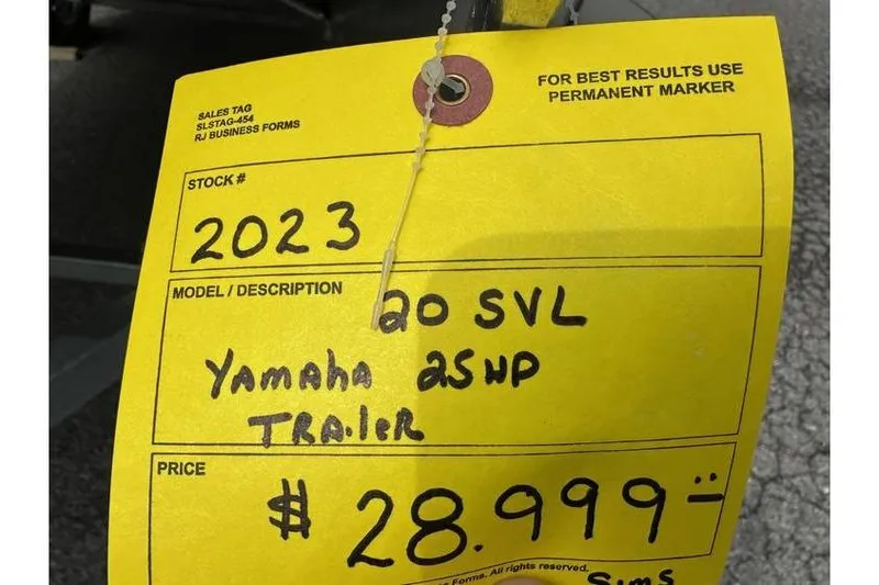 Slide: The Image of Yellow sales tag for 2023 Bennington 20 SVL with Yamaha 25HP, priced at $28,999. - 4