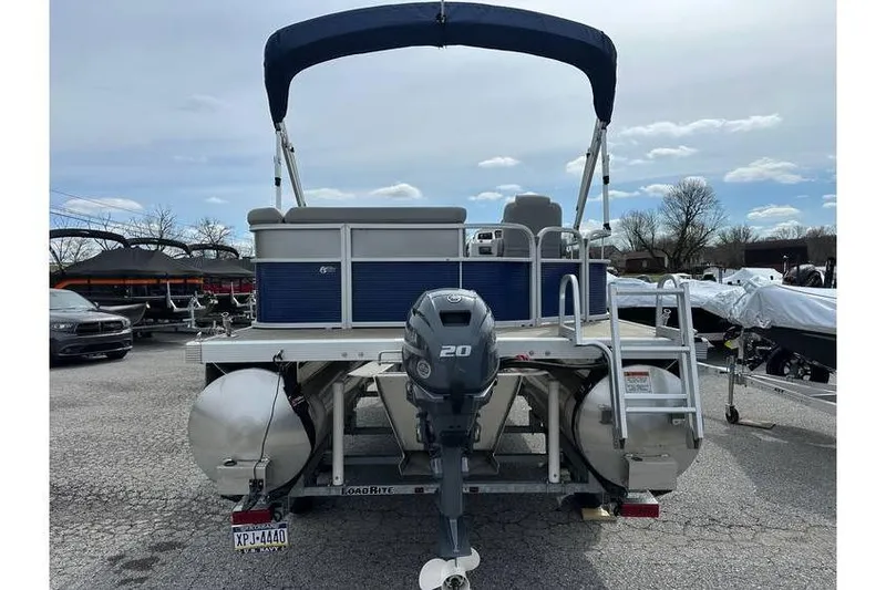 Slide: The Image of 2023 Bennington 20 SVL pontoon boat with Yamaha 25Hp engine and tandem axle trailer. - 8
