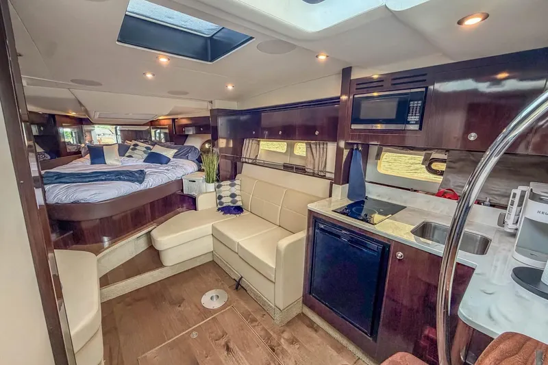 Slide: The Image of Luxurious interior of 2017 Sea Ray Sundancer 350 Coupe with cozy seating and modern amenities. - 28