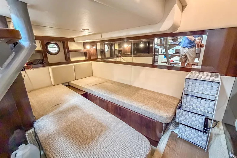 Slide: The Image of Interior of 2017 Sea Ray Sundancer 350 Coupe with cozy seating and modern decor. - 32