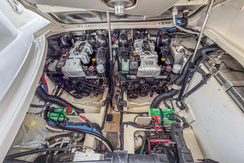 Slide: The Image of Engine compartment of 2017 Sea Ray Sundancer 350 Coupe with dual V8 engines. - 35
