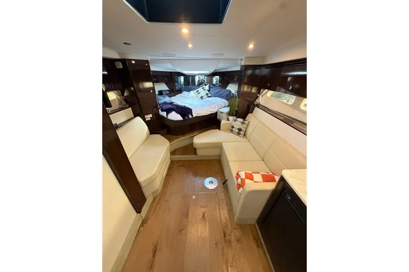 Slide: The Image of Luxurious interior of 2017 Sea Ray Sundancer 350 Coupe with cozy seating and elegant decor. - 5