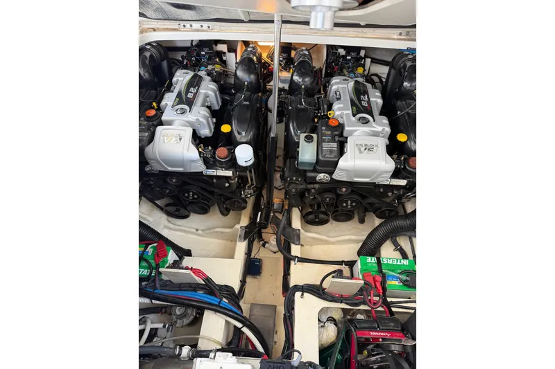 Slide: The Image of Engine compartment of a 2017 Sea Ray Sundancer 350 Coupe with dual V8 engines. - 9