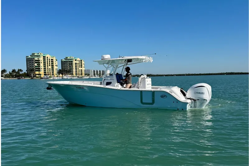 Slide: The Image of 2021 Sea Fox 288 Commander boat on calm water. - 3