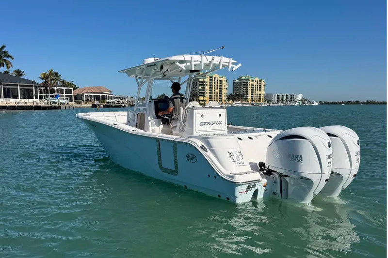 Slide: The Image of 2021 Sea Fox 288 Commander boat on calm waters. - 5