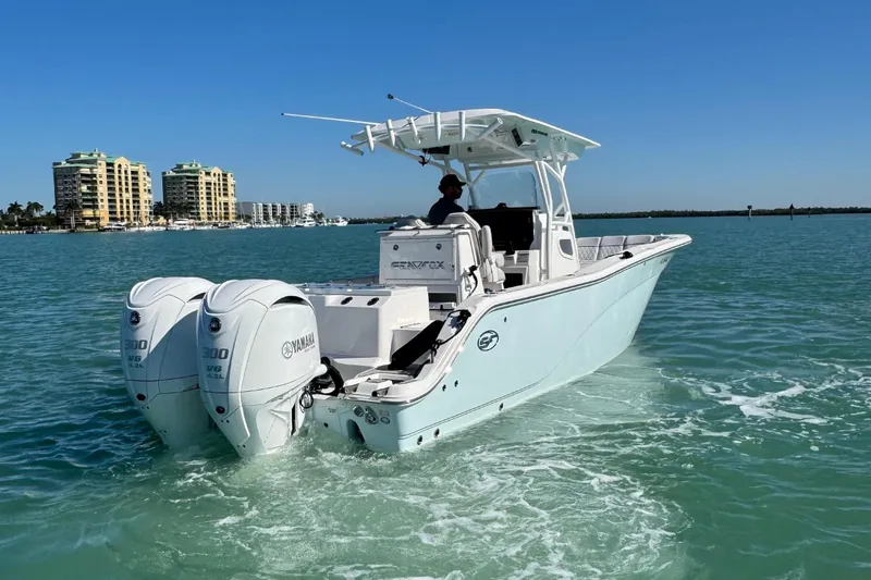 Slide: The Image of Sea Fox 288 Commander 2021 on water with dual Yamaha engines. - 9