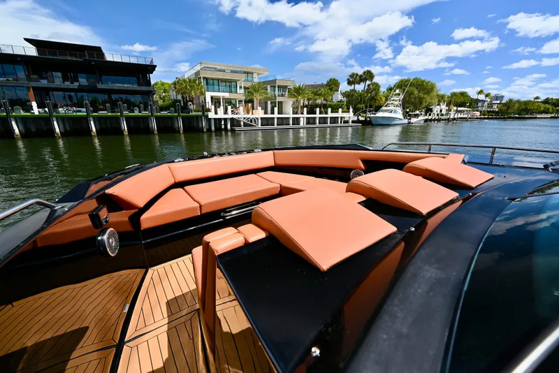 Slide: The Image of Luxurious 2022 Cruisers Yachts 38 GLS OB with spacious deck and waterfront view. - 23