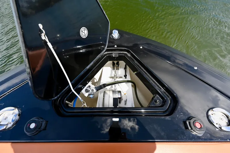 Slide: The Image of Open hatch on 2022 Cruisers Yachts 38 GLS OB, revealing interior components. - 24