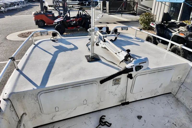 Slide: The Image of 2009 Carolina Skiff 18 DLX boat deck with trolling motor and storage compartments. - 3