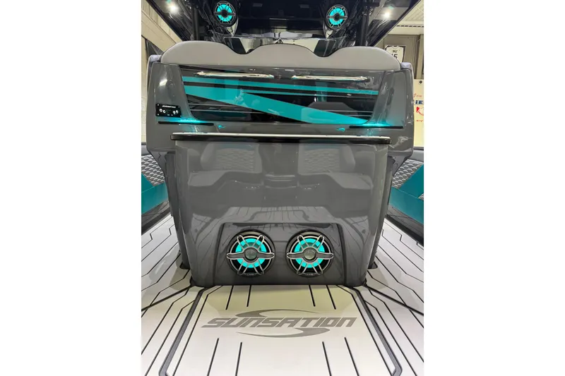 Slide: The Image of 2026 Sunsation 34 CCX boat interior with sleek design and vibrant blue accents. - 13