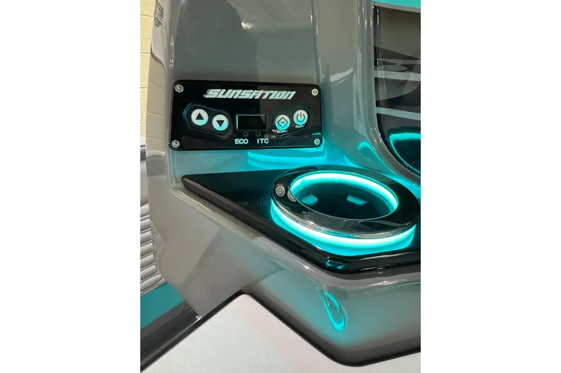 Slide: The Image of Control panel and illuminated cup holder on 2026 Sunsation 34 CCX boat. - 15