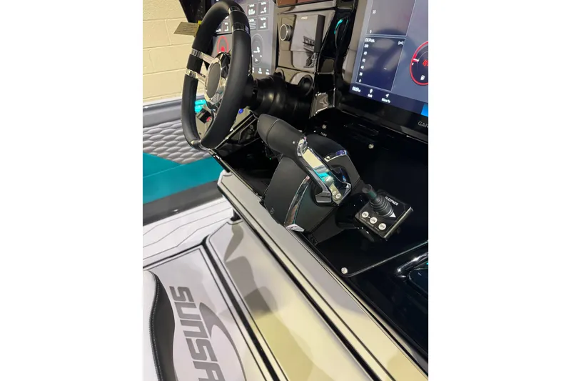 Slide: The Image of 2026 Sunsation 34 CCX cockpit with steering wheel and control panel. - 17