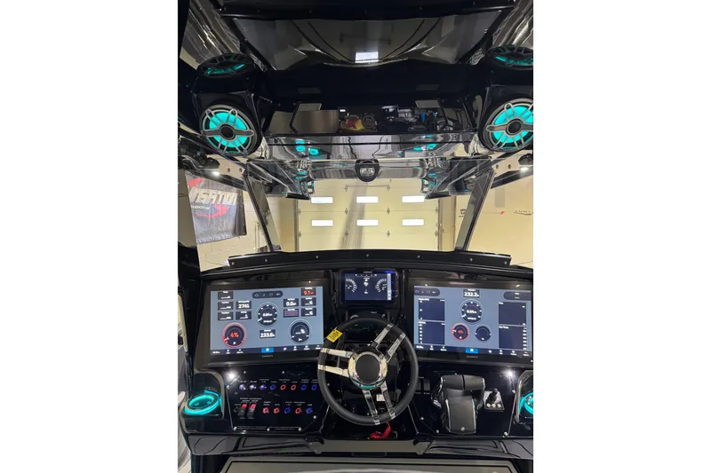 Slide: The Image of 2026 Sunsation 34 CCX dashboard with advanced digital displays and modern controls. - 18