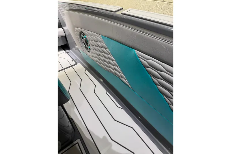 Slide: The Image of 2026 Sunsation 34 CCX interior with teal and gray quilted upholstery design. - 20