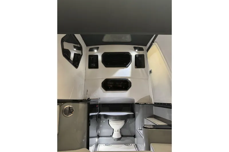 Slide: The Image of Interior of 2026 Sunsation 34 CCX boat, featuring modern amenities and sleek design. - 25