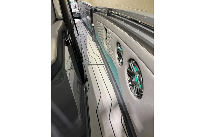 Slide: The Image of 2026 Sunsation 34 CCX interior with sleek design and modern speaker system. - 26