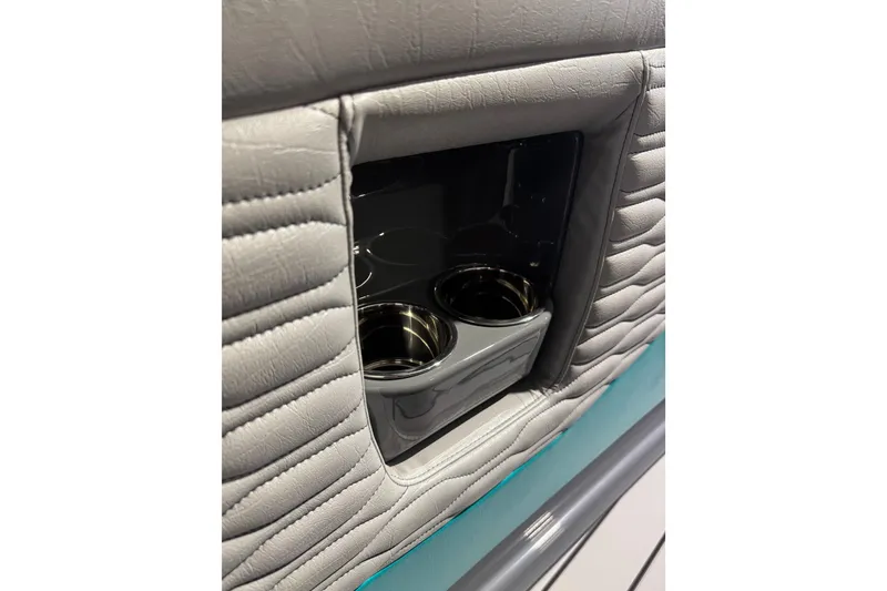 Slide: The Image of Interior of 2026 Sunsation 34 CCX featuring sleek cup holders and stylish upholstery. - 27