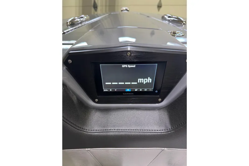 Slide: The Image of 2026 Sunsation 34 CCX dashboard with Garmin GPS speed display. - 33