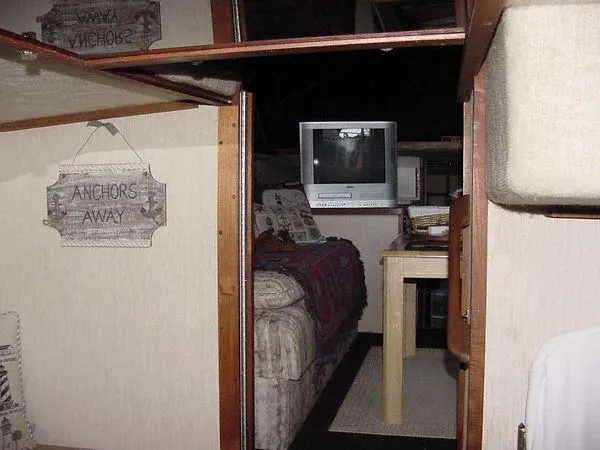 Slide: The Image of Interior of 1985 Carver 3207 Yacht with TV and sofa. - 8