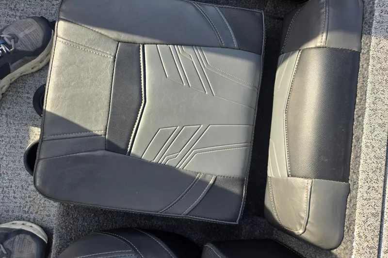 Slide: The Image of 2020 Tracker Pro Team 190 TX Tournament Edition boat seat with sleek design and stitching. - 14