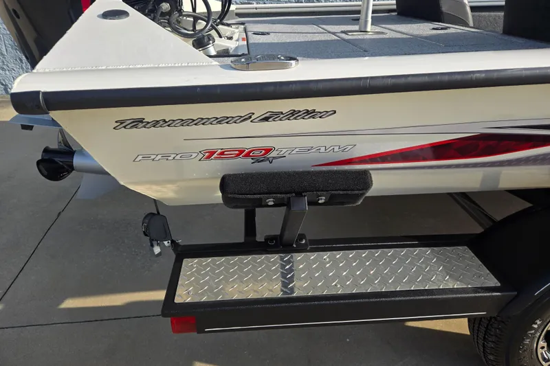 Slide: The Image of 2020 Tracker Pro Team 190 TX Tournament Edition boat rear view with step platform. - 4