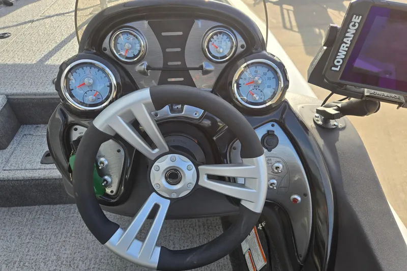 Slide: The Image of 2020 Tracker Pro Team 190 TX Tournament Edition dashboard with steering wheel and gauges. - 6