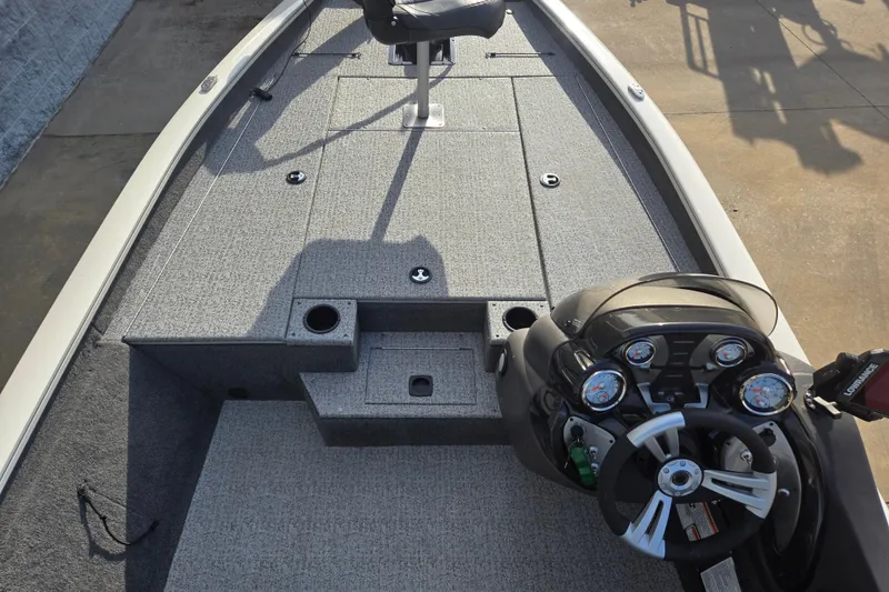 Slide: The Image of 2020 Tracker Pro Team 190 TX Tournament Edition boat interior with steering console. - 8