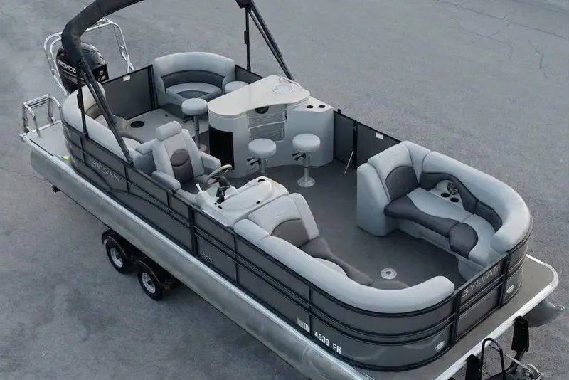 The Image of 2014 Sylvan Mirage 8522 LZ pontoon boat with spacious seating and modern design. - 1