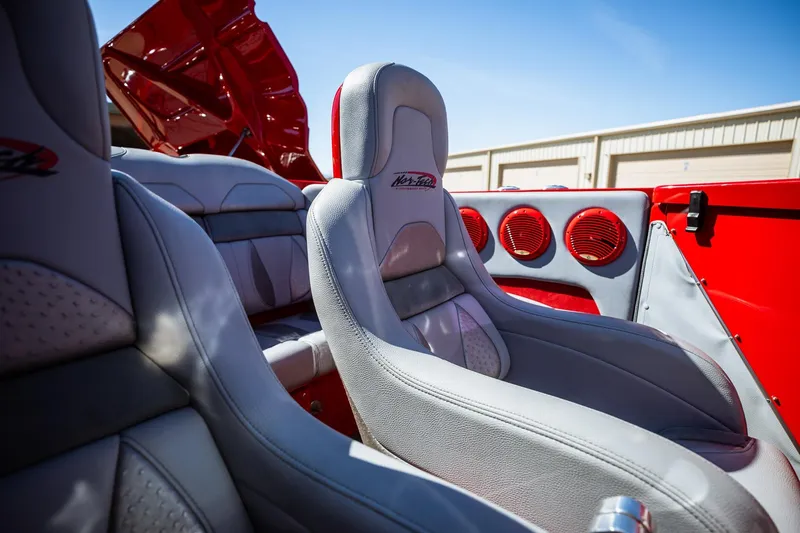Slide: The Image of Interior of 2008 Nor-Tech 3600 Supercat with red and gray seating. - 34