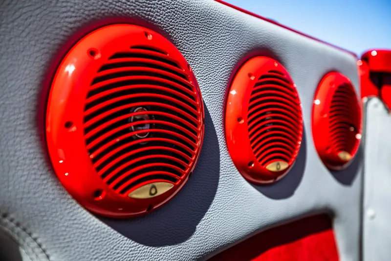 Slide: The Image of Red speakers on a 2008 Nor-Tech 3600 Supercat boat interior. - 37