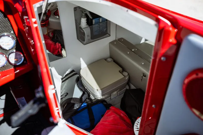 Slide: The Image of Interior of 2008 Nor-Tech 3600 Supercat showing storage and equipment. - 38