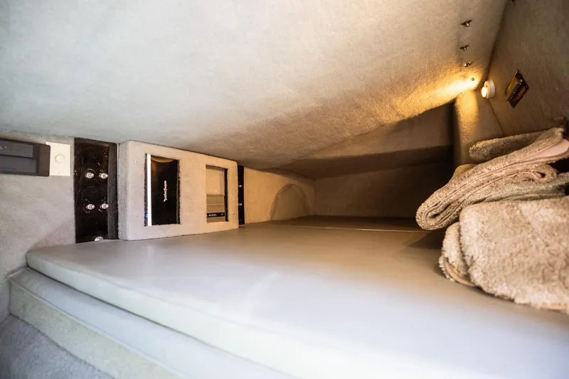 Slide: The Image of Interior cabin of 2008 Nor-Tech 3600 Supercat with cozy bedding and ambient lighting. - 40