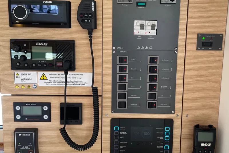 Slide: The Image of Control panel of 2023 Hanse 460 yacht with navigation and communication equipment. - 16