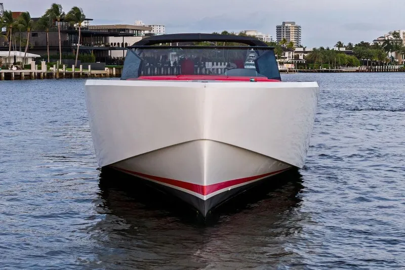 Slide: The Image of 2016 Vanquish Yachts VQ48 luxury yacht on calm water, front view. - 2