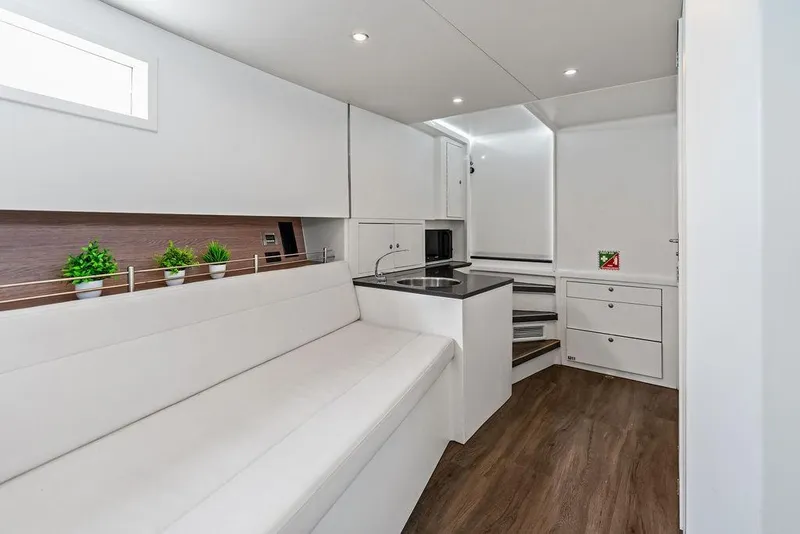 Slide: The Image of Luxurious interior of 2016 Vanquish Yachts VQ48 with modern seating and sleek design. - 27