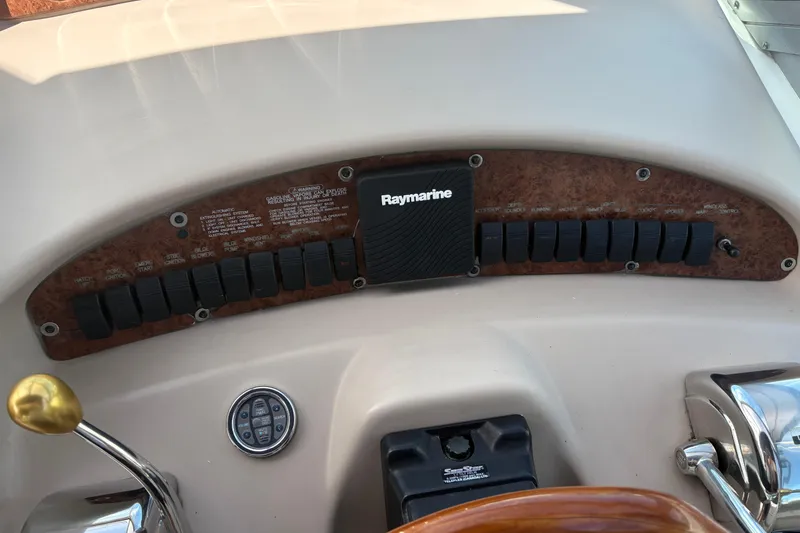 Slide: The Image of Engine compartment of a 2000 Sea Ray 340 Sundancer with twin Mercury V8 engines. - 11