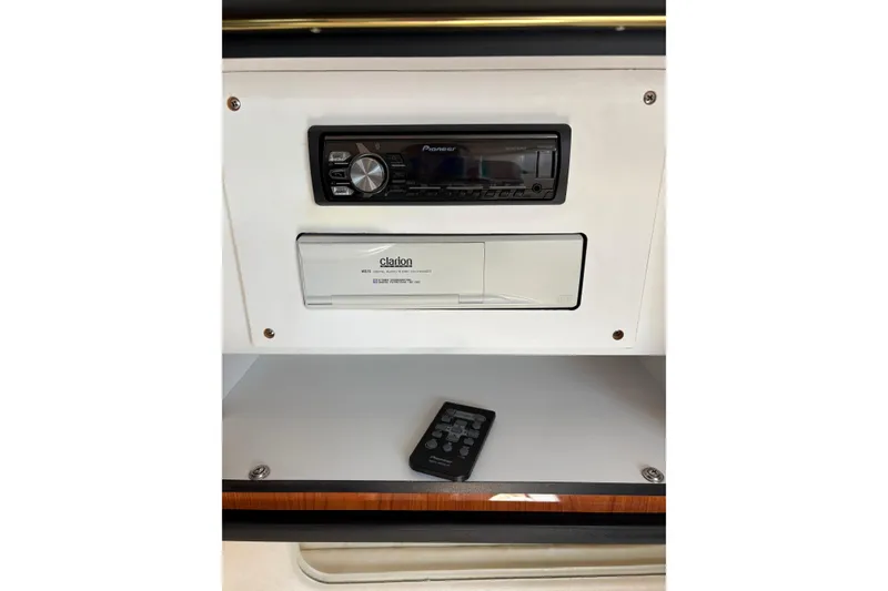 Slide: The Image of Stereo system with remote in a 2000 Sea Ray 340 Sundancer boat. - 20