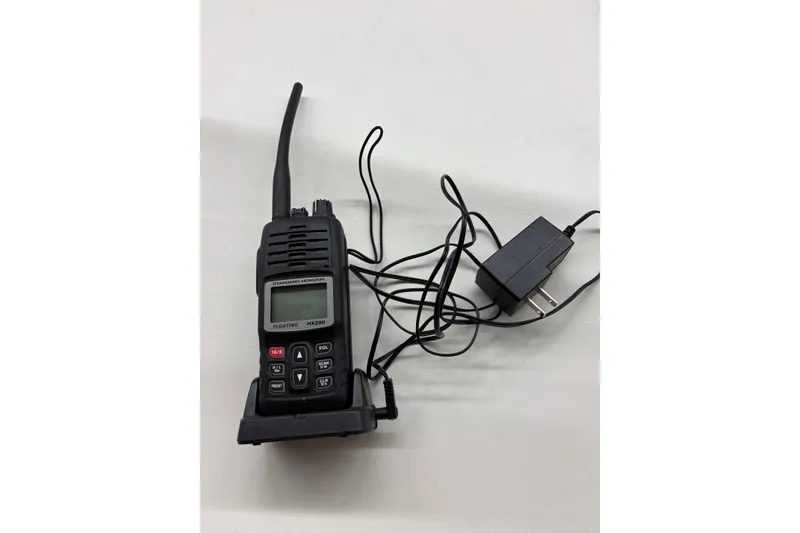 Slide: The Image of Handheld marine radio with charger, suitable for Sea Ray 340 Sundancer 2000 model. - 28