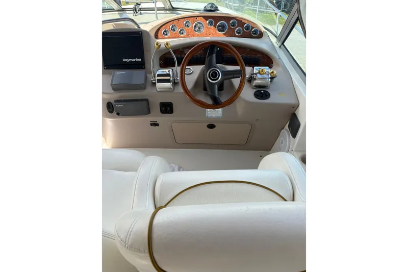 Slide: The Image of Raymarine display on 2000 Sea Ray 340 Sundancer boat dashboard. - 9