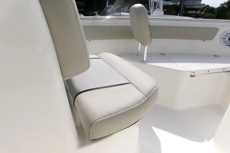 Slide: The Image of 2026 Key West 203 FS boat interior seating with sleek, modern design. - 10