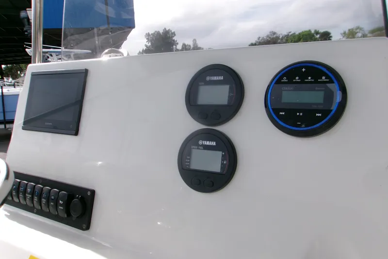 Slide: The Image of Dashboard of 2026 Key West 203 FS boat with Yamaha gauges and Clarion audio system. - 12