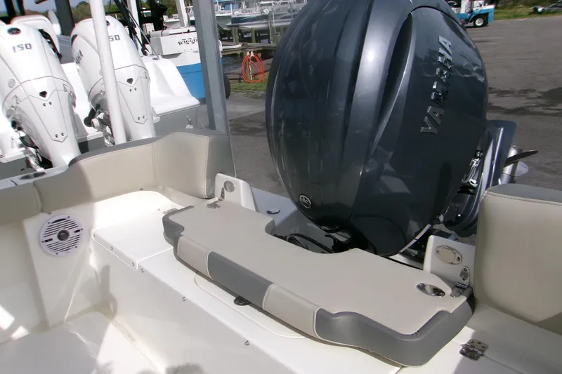 Slide: The Image of 2026 Key West 203 FS boat with Yamaha outboard motor, featuring a sleek interior design. - 4