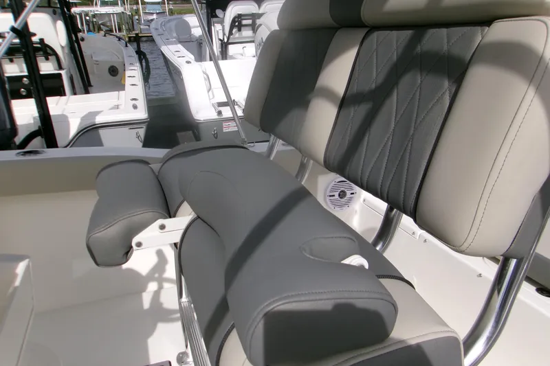 Slide: The Image of 2026 Key West 203 FS boat interior with cushioned seating and sleek design. - 5