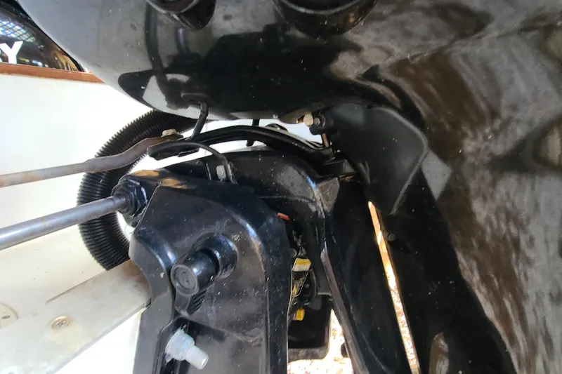 Slide: The Image of Close-up of 1983 Mako 20 Center Console boat engine components. - 20