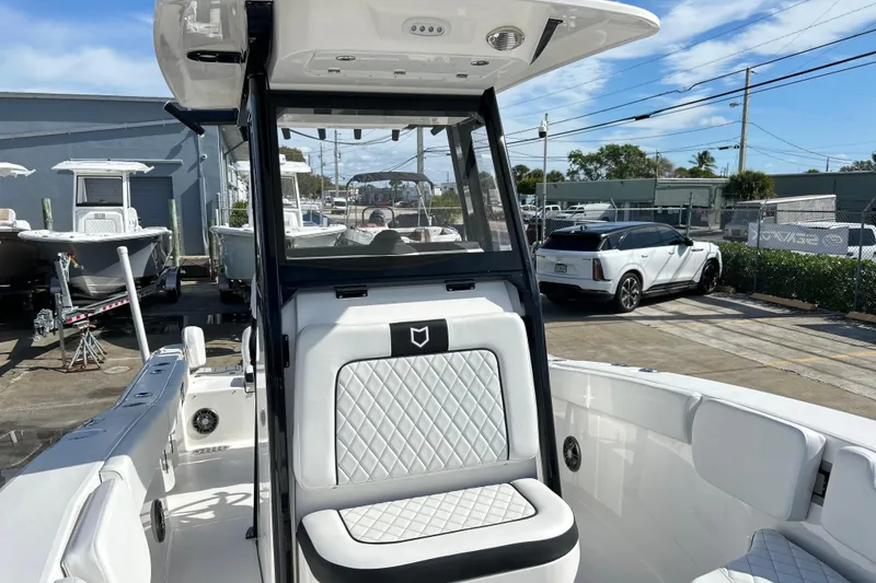 Slide: The Image of 2026 Sea Fox 228 Commander boat interior with sleek seating and modern design. - 21