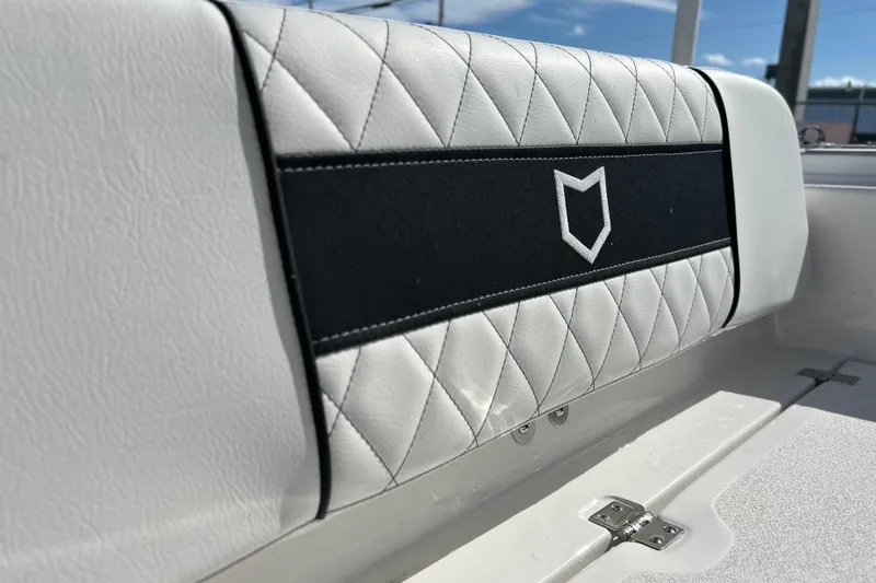 Slide: The Image of 2026 Sea Fox 228 Commander boat seat with diamond stitching and logo detail. - 30