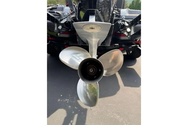 Slide: The Image of 2022 Nitro Z21 XL boat propeller close-up on pavement. - 6