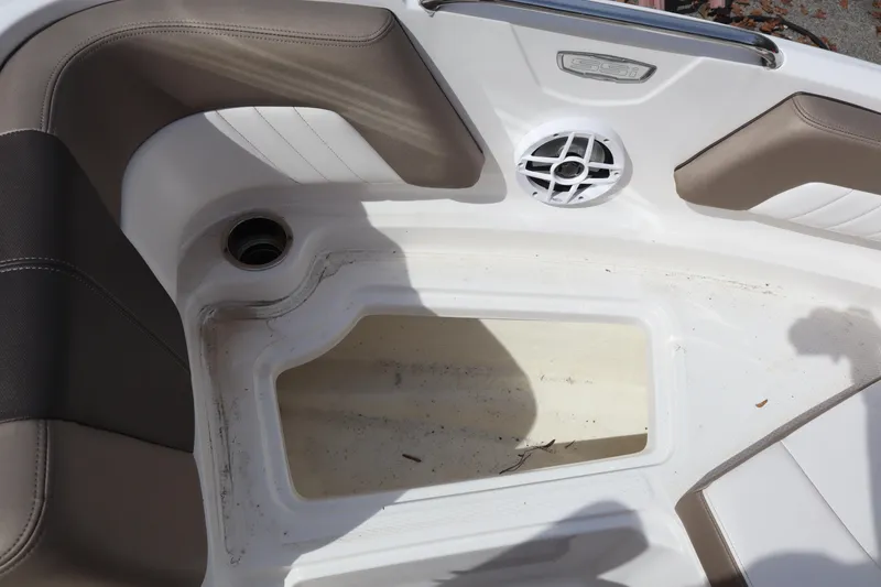 Slide: The Image of 2021 Chaparral 21 SSi boat interior with seating and speaker detail. - 8